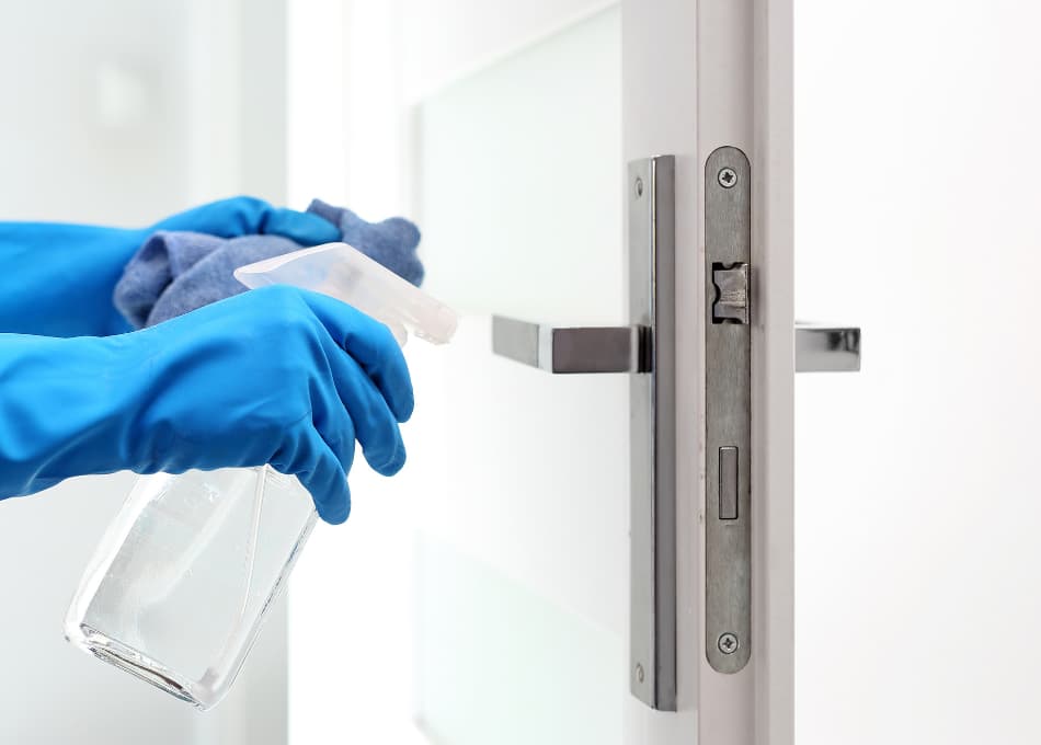 Sanitizing office door with sanitizing product